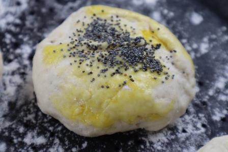 bread roll with poppy seeds