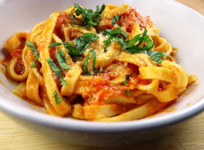 pasta dish garnished with basil