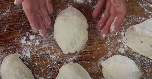 shape the German bread rolls